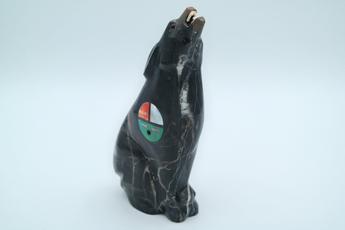 Brown and Black Jasper Wolf Carving with Sunface Inlay