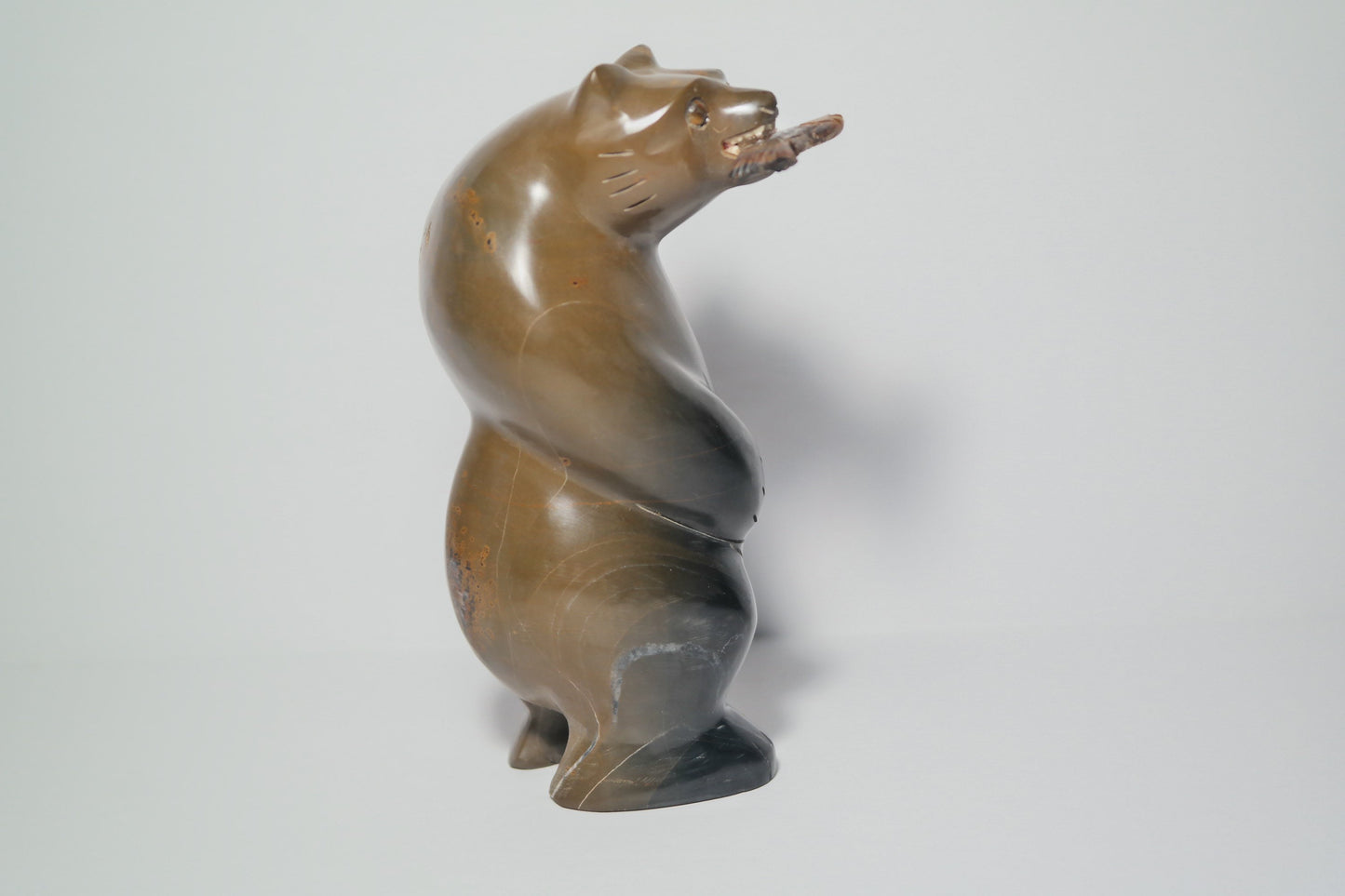 Brown and Black Jasper Bear holding a fish Carving