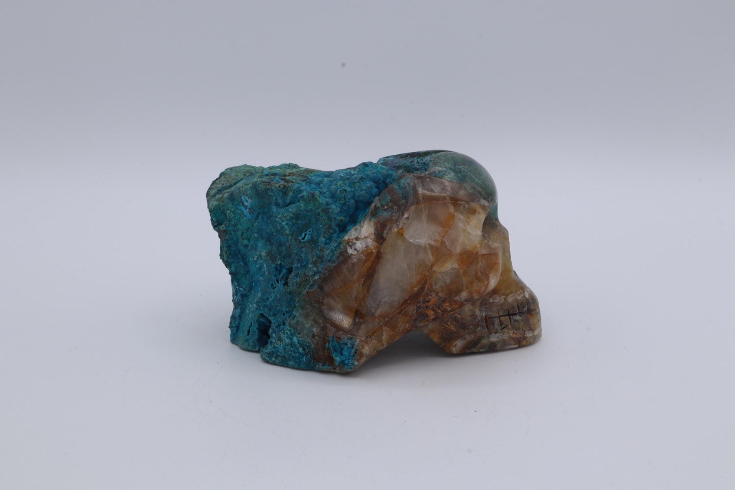 Chrysocolla and Quartz Skull Carving