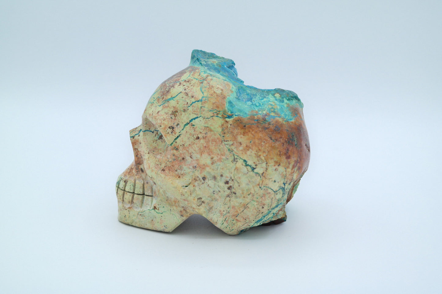 Skull carving made of Chrysocolla Turquoise