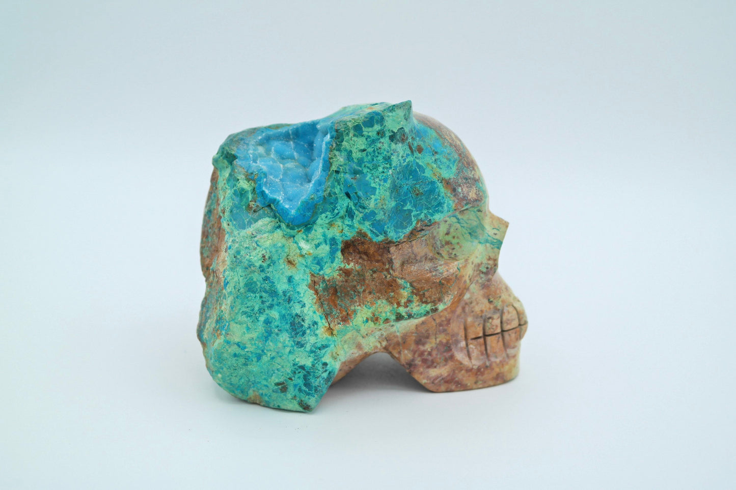 Skull carving made of Chrysocolla Turquoise